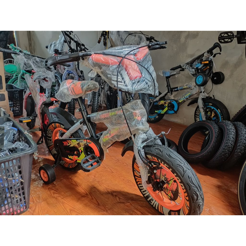 Sepeda bmx velion ring 12 ban besar (warna oren)