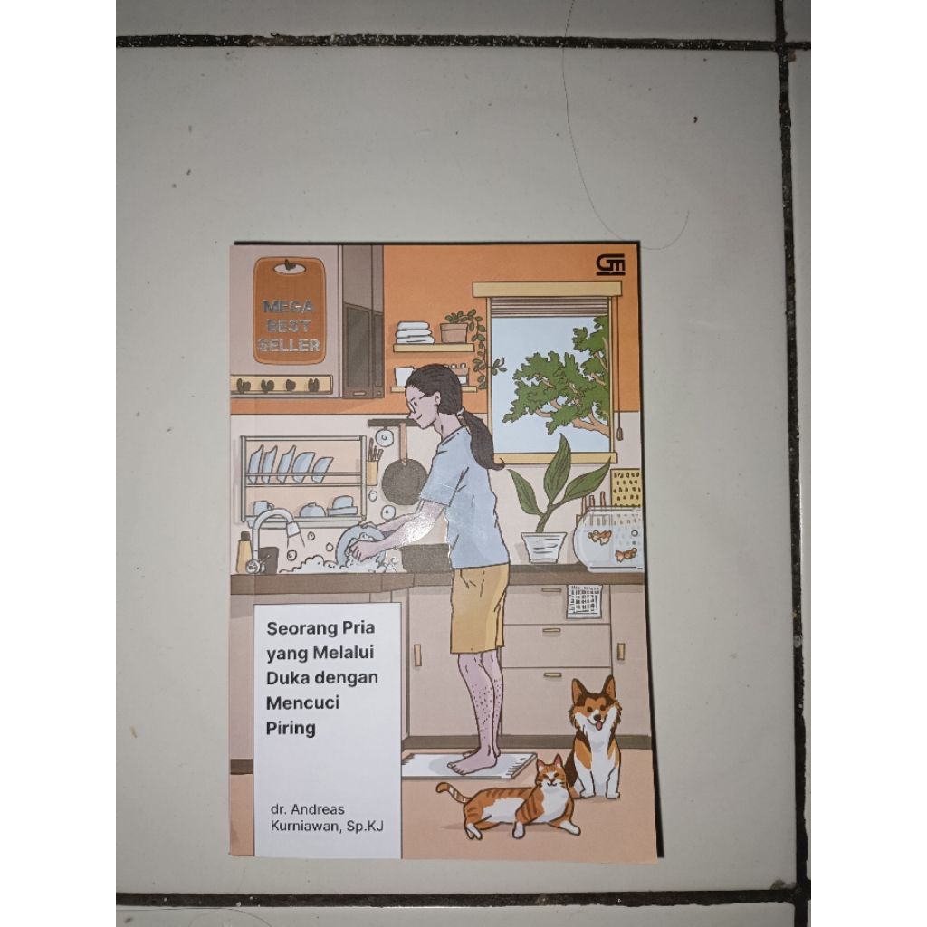 preloved buku seorang pria yang melalui duka dengan mencuci piring