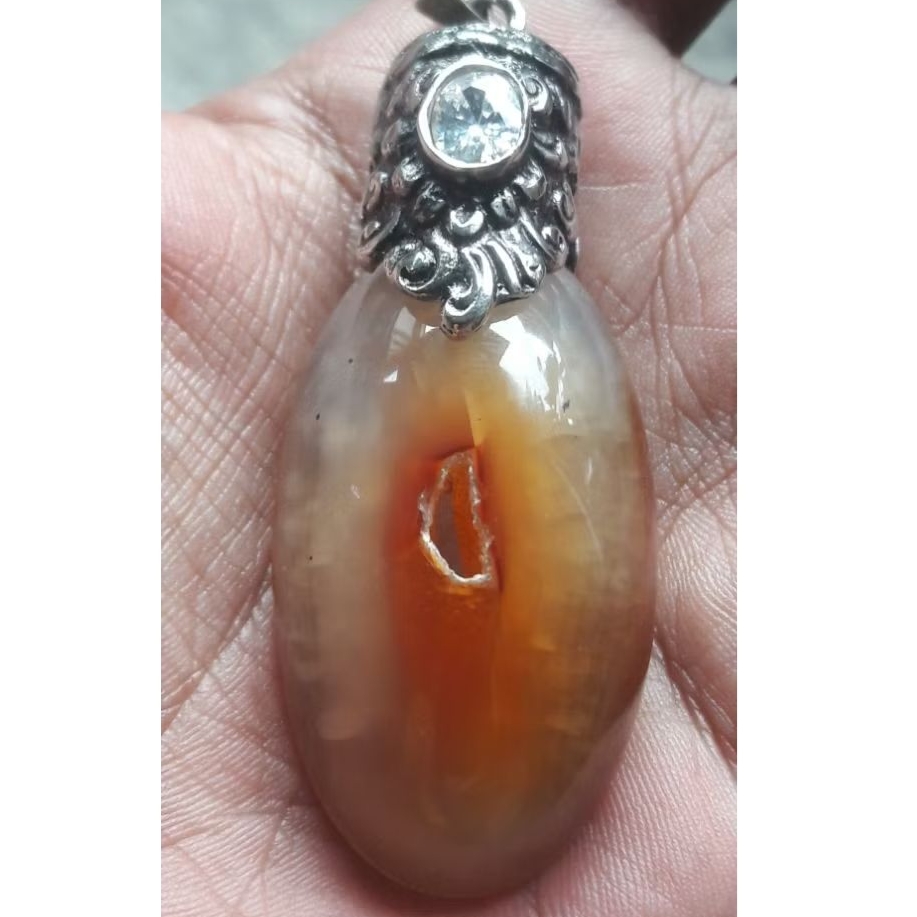 liontin batu pandan nanas combong