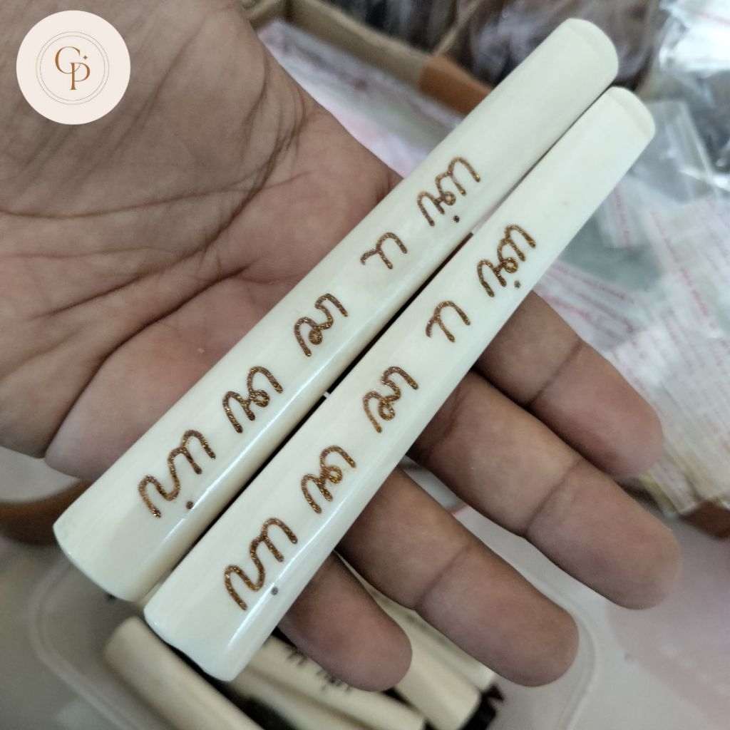 Pipa once / once cangklong tulang ukir aksara Jawa