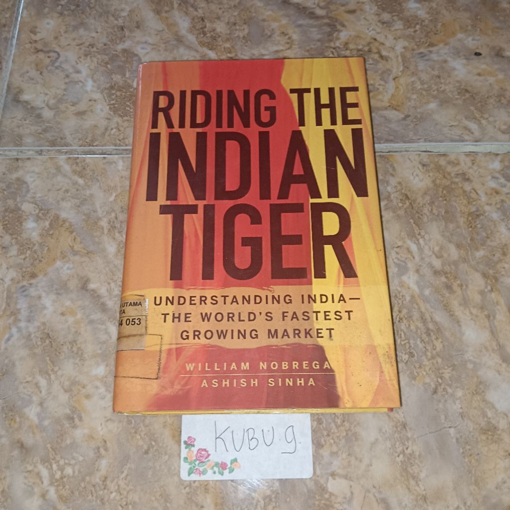 Buku Riding the Indian Tiger - William
