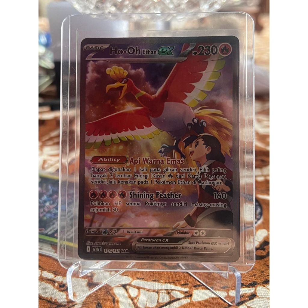 Ho-oh Ethan Ex SAR - SV10s Kehadiran Juara