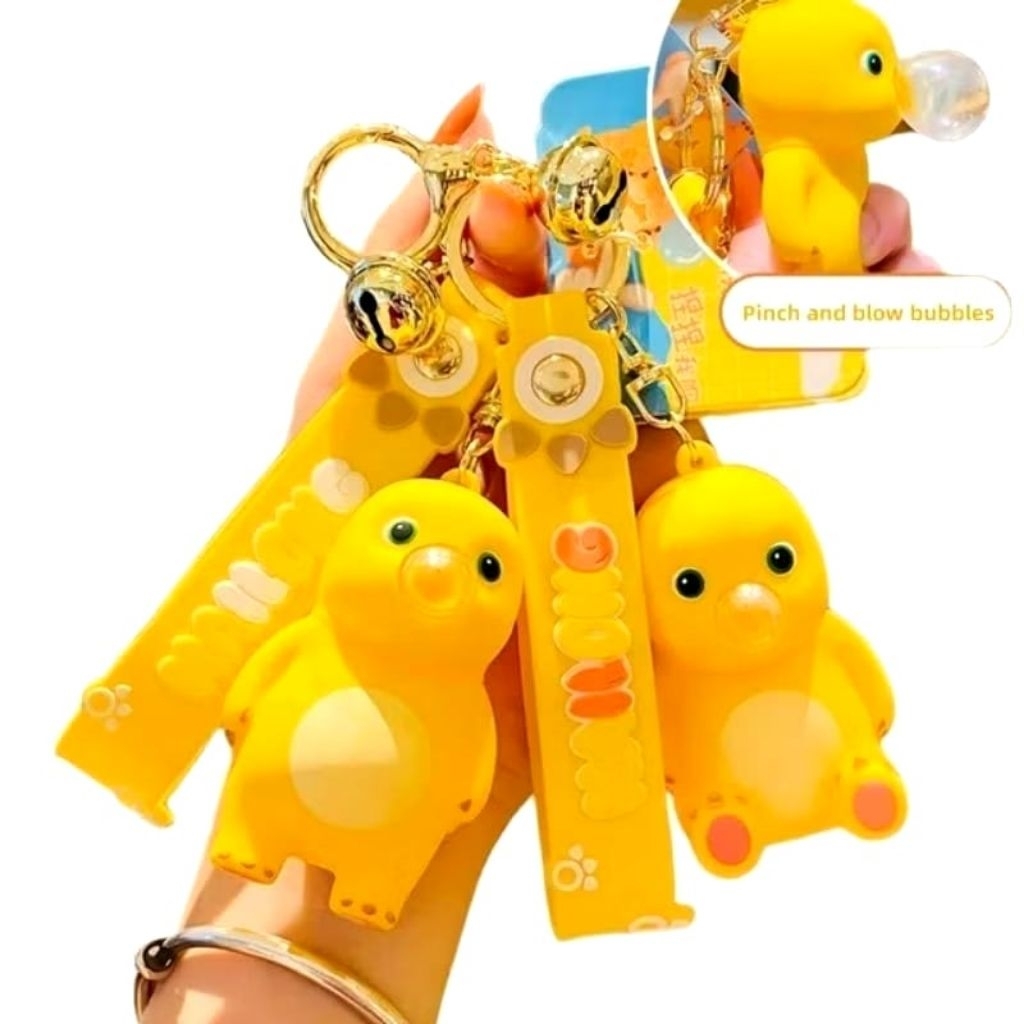 Gantungan dino kuning / pink bubble