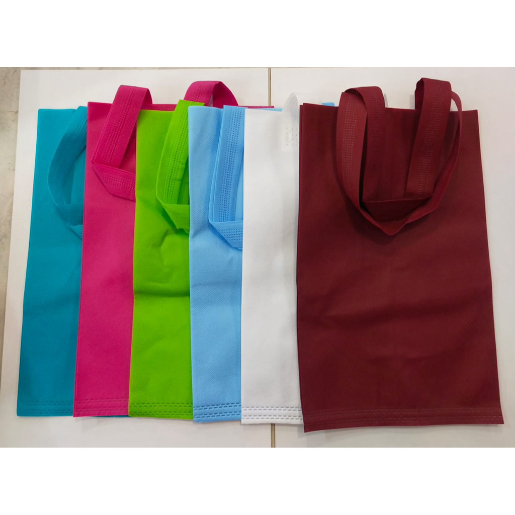 

TAS SPOUNDBOUND//GOODIE BAG BOX NASI PRESS UK.20x20cm