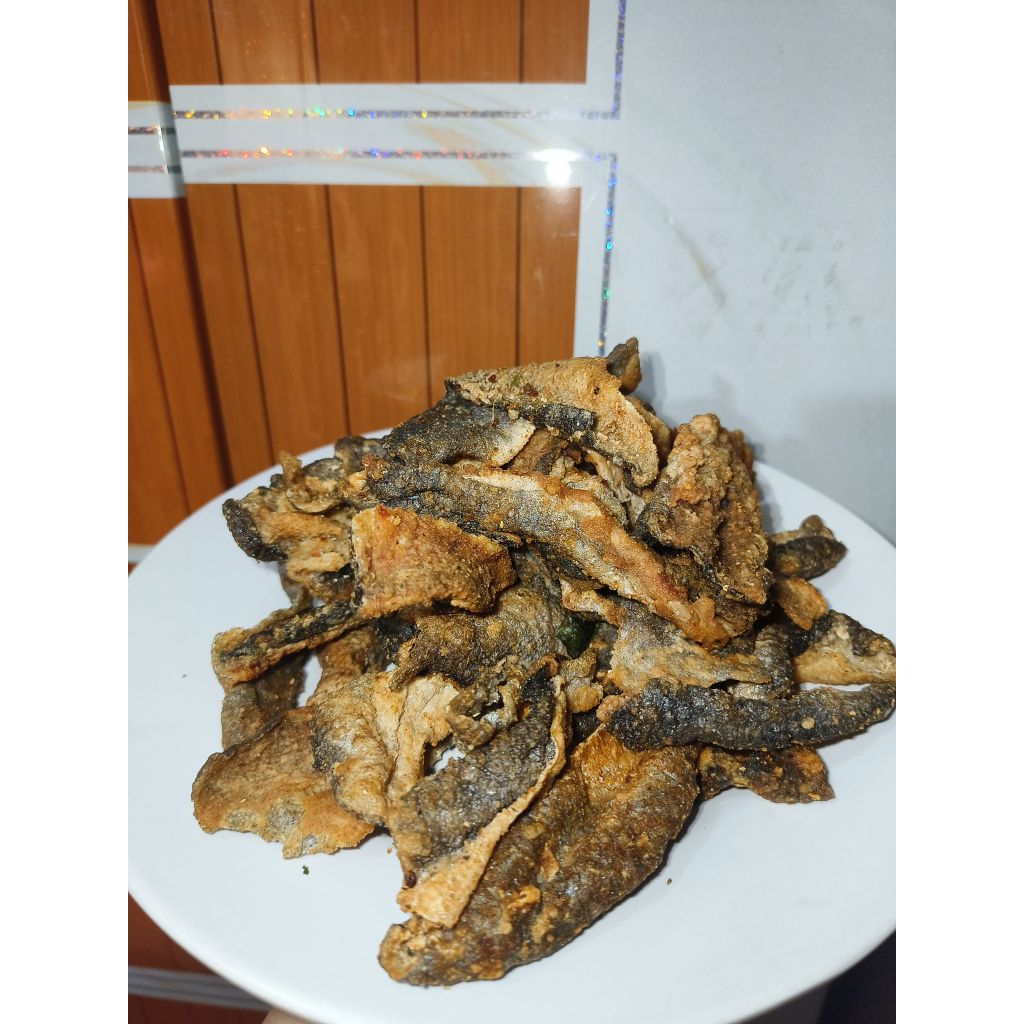 

Keripik Kulit Ikan Patin Pedas Daun Jeruk 100 Gram