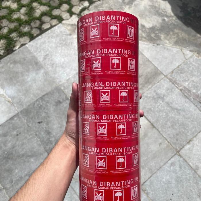 

LAKBAN FRAGILE MERAH tulisan JANGAN DI BANTING - BARANG MUDAH PECAH / BOCOR 48MM X 90 YARD