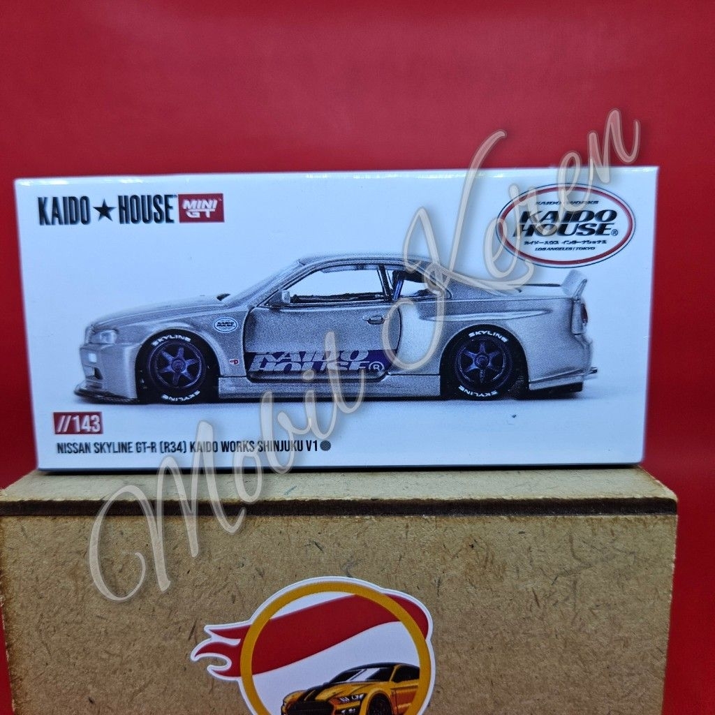 Diecast Mini GT Kaido House 143 Nissan Skyline GT-R (R34) Kaido Works Shinjuku V1 silver ban karet