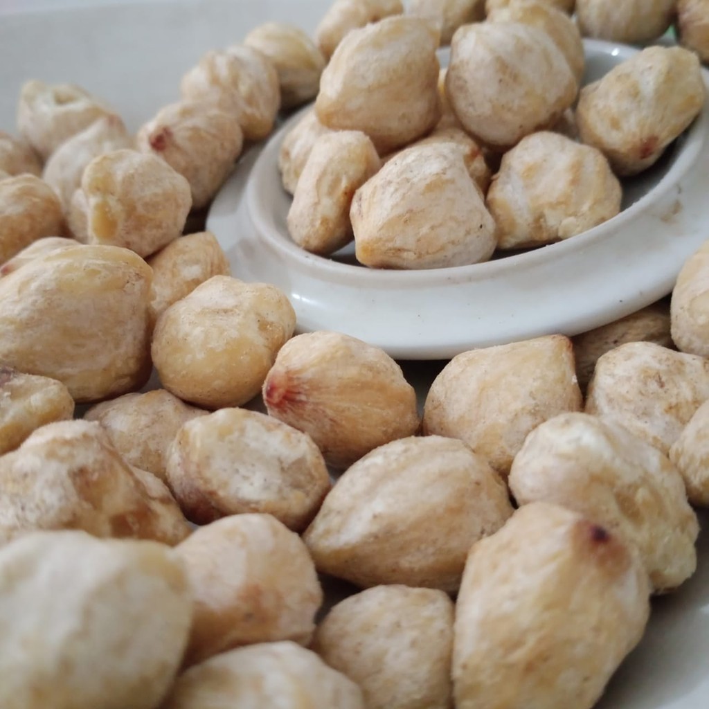 

ready instan kemiri kupas bulat utuh berkualitas kemasan 1kg dan 500 gram