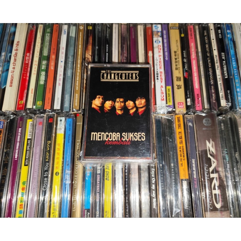 Kaset Pita The Changcuters - Mencoba Sukses Kembali ( Lengkap Dengan Bonus Sticker )