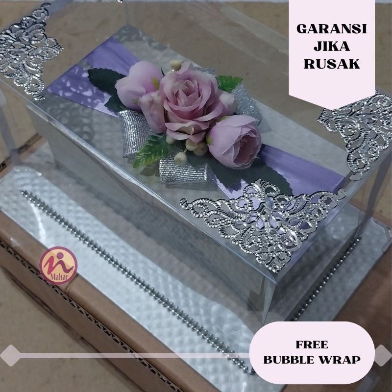 Kotak uang mahar tertutup dengan mika