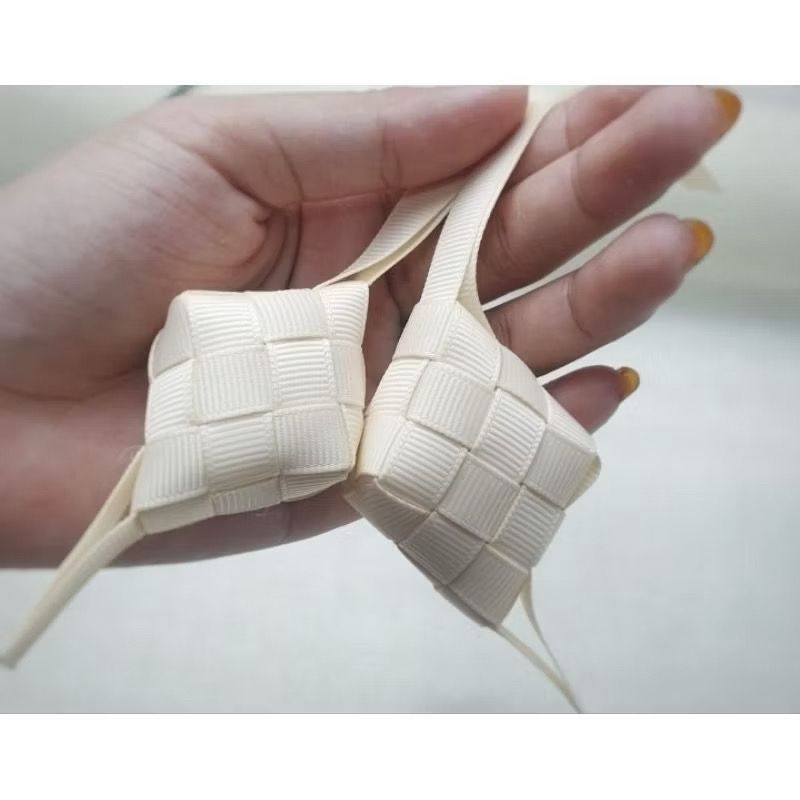 

1 BUAH - KETUPAT PITA 9MM CREAM
