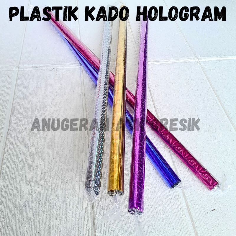 

[1 SLOP =10 LEMBAR] PLASTIK KADO HOLOGRAM / MENGKILAP