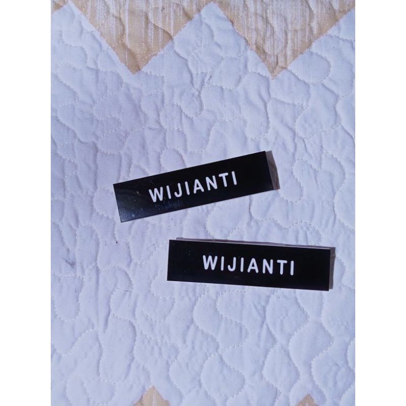 

Nametag/papan nama