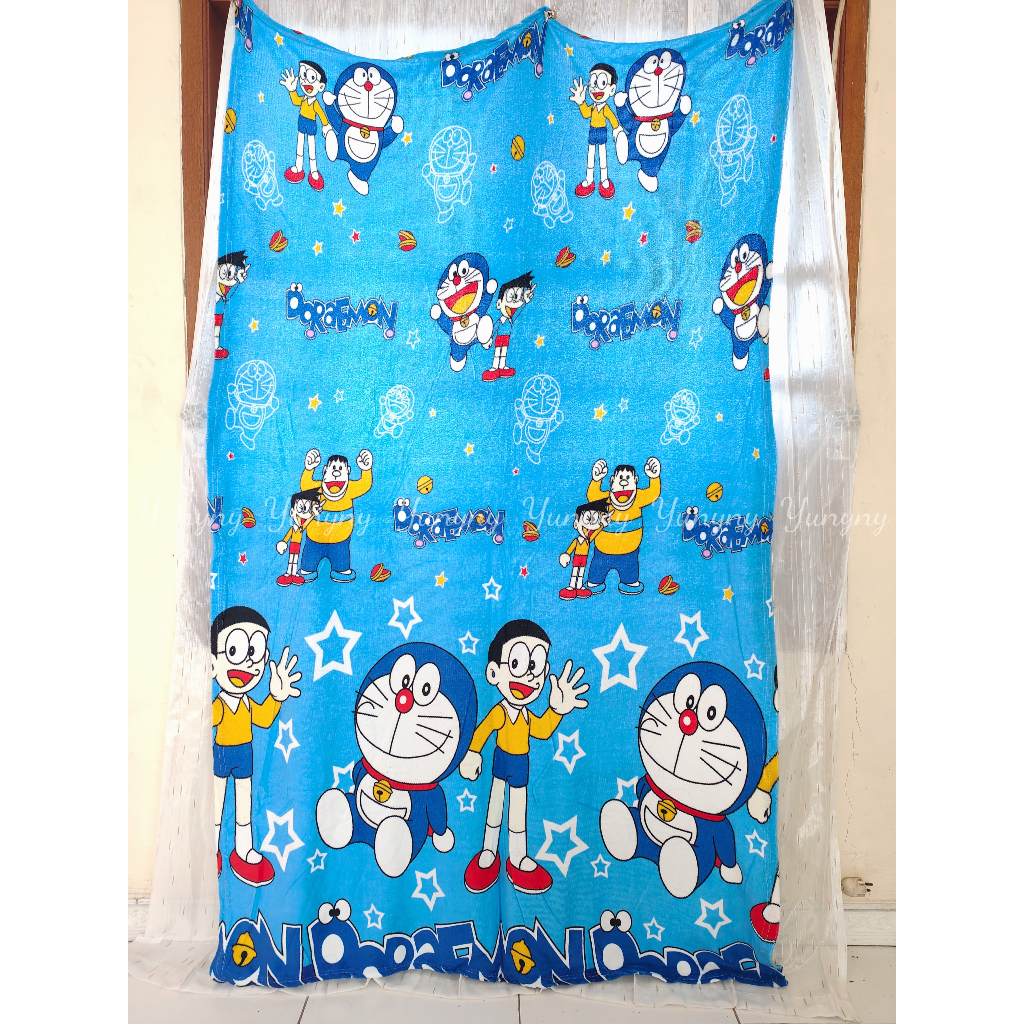 Selimut bulu karakter doraemon fly