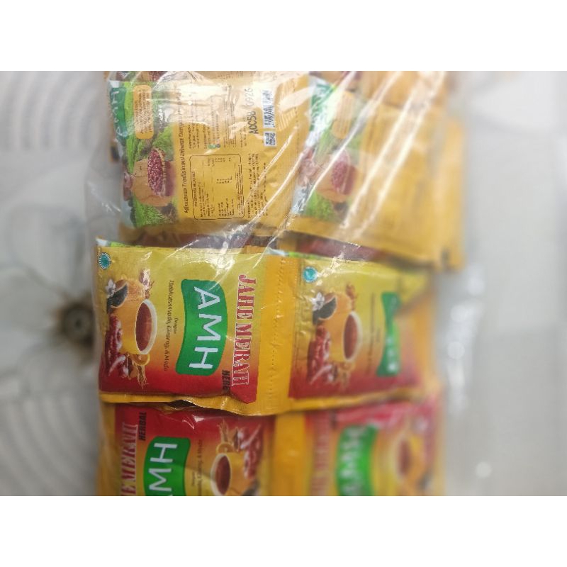 

(1 Renteng 10 Sachet)Jahe Merah Herbal AMH Dengan Habbatussauda Gingseng Dan Madu