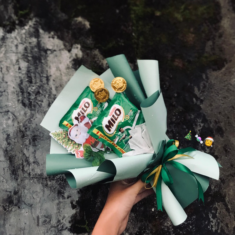 

Buket Natal Manis & Hangat - 2 Sachet Milo -3 Cokelat Bundar