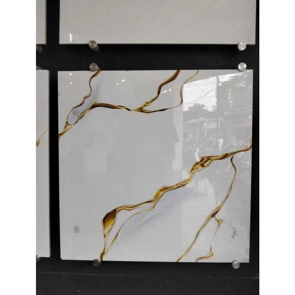 GRANIT LANTAI PUTIH CORAK EMAS UKURAN 60X60 GLAZE POLISHED | ARNA CALIANA GOLD 60X60