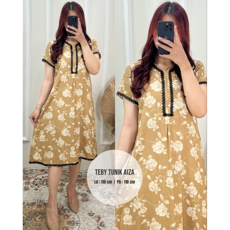 Teby Tunik Aiza