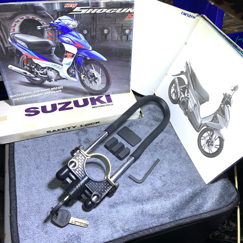 Kunci ganda pengaman motor , gembok roda pengaman motor , kunci ganda garpu motor suzuki dan