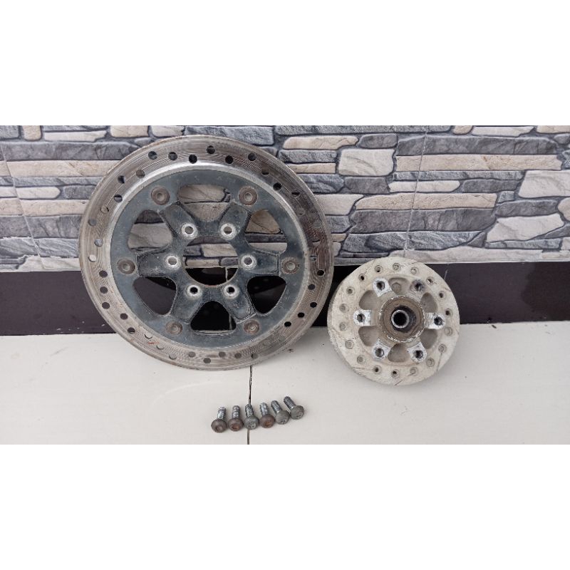 tromol depan tiger revo awal ori