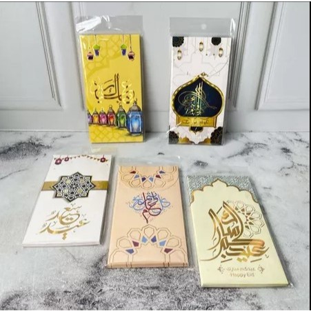 

Isi 5 Pcs Amplop Lebaran Idul Fitri Putih Ukuran Sedang 9 cm x 15 cm Motif Kaligrafi Bahan Glossy Tersedia 5 Varian