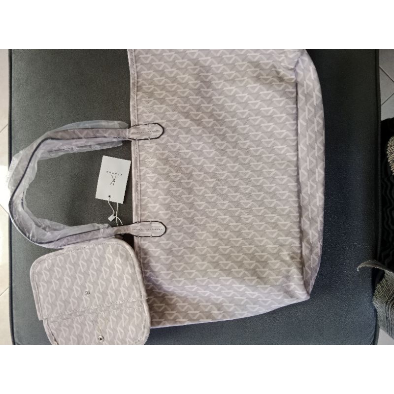 tas goyard