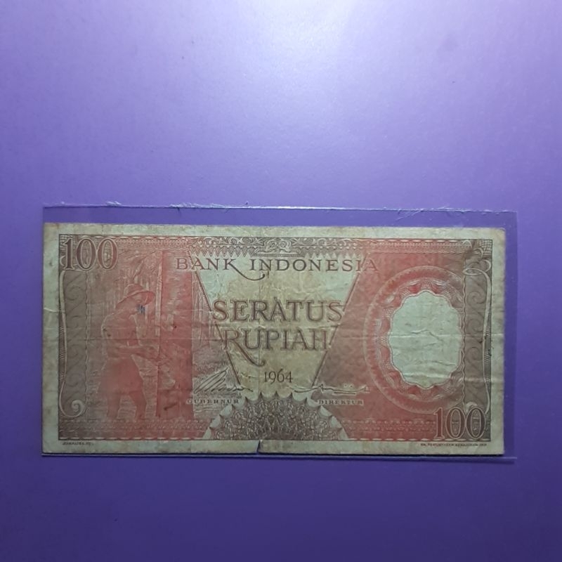 Uang kuno 100 rupiah seri pekerja tahun 1964