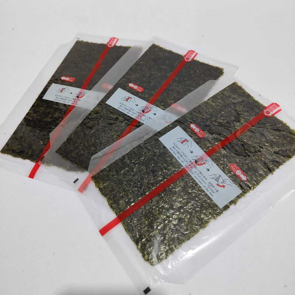 

Maru Nori Oniri Wrapper 100 Lembar - Triangle Sushi Nori Wrap Sheets Seaweed Premium 100s