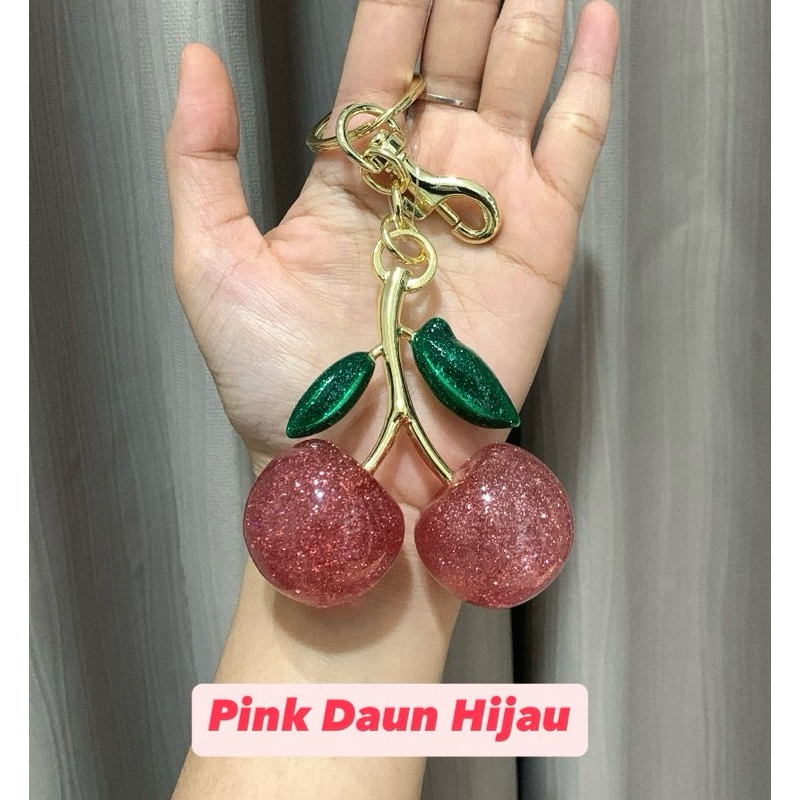 Gantungan cherry. Bukan coach