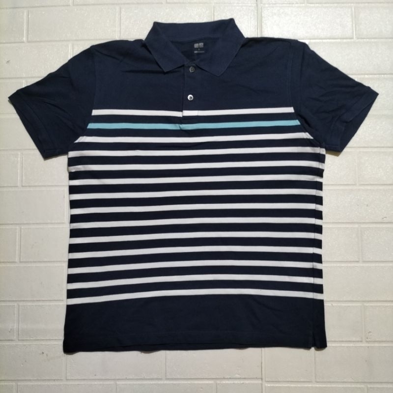 714. POLO SHIRT KAOS  UNIQLO Size L Tag/M  P65  LD106