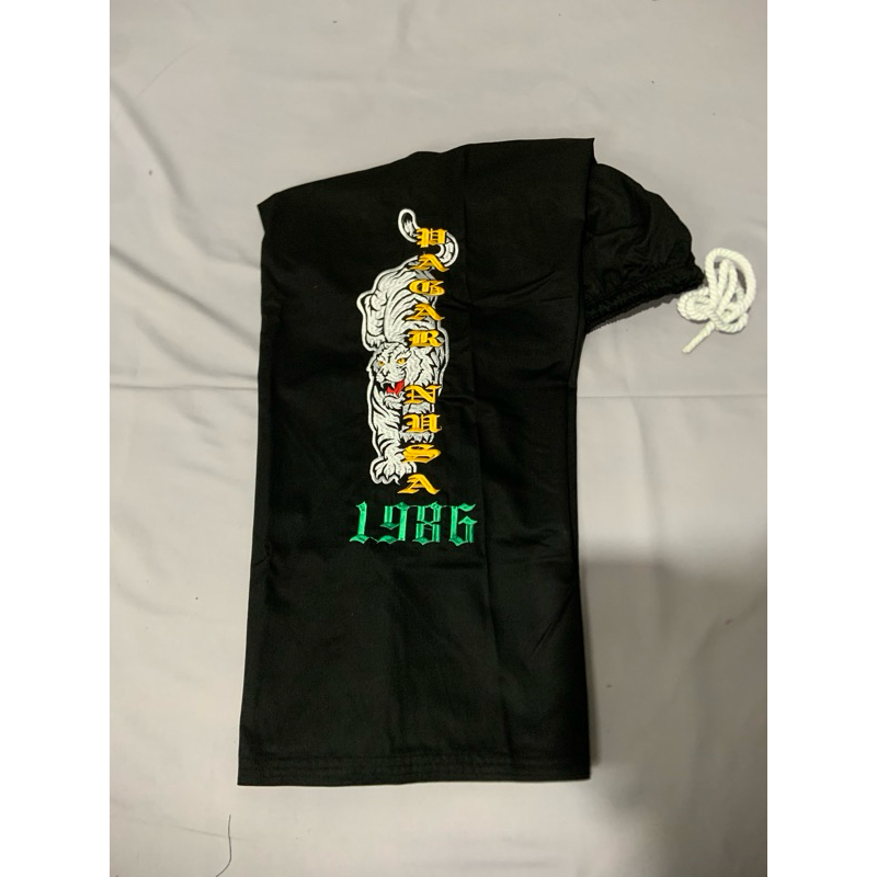 komprang pagar nusa bordir motif macan putih