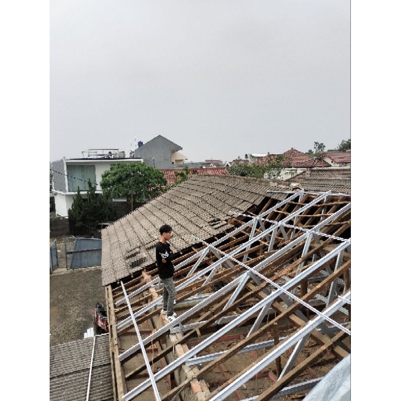 Renovasi atap rumah