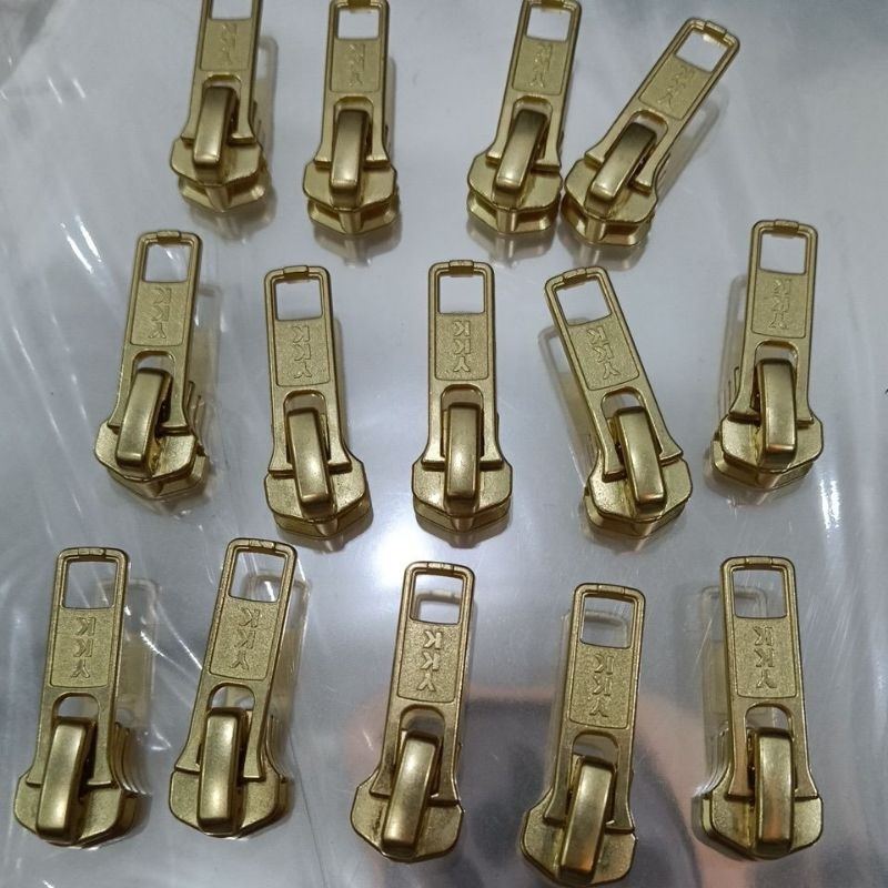 kepala resleting besi