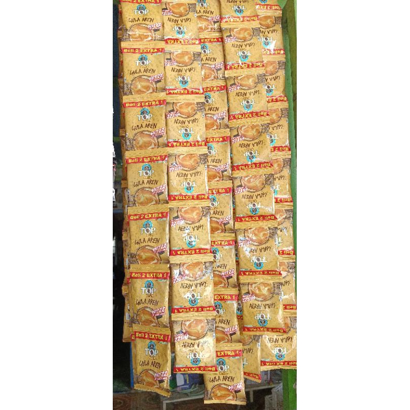 

kopi top caffe gula aren 22gr 1 renteng 15pc
