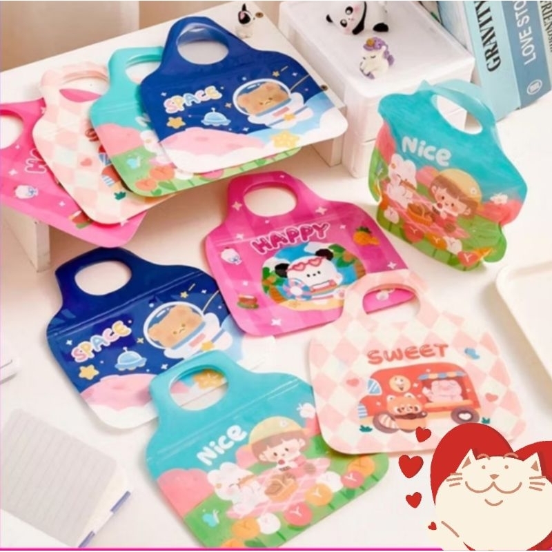 

Plastik ziplock mini motif karakter / tas jinjing / plastic bag Zipper / goddie bag permen roti kue chiki