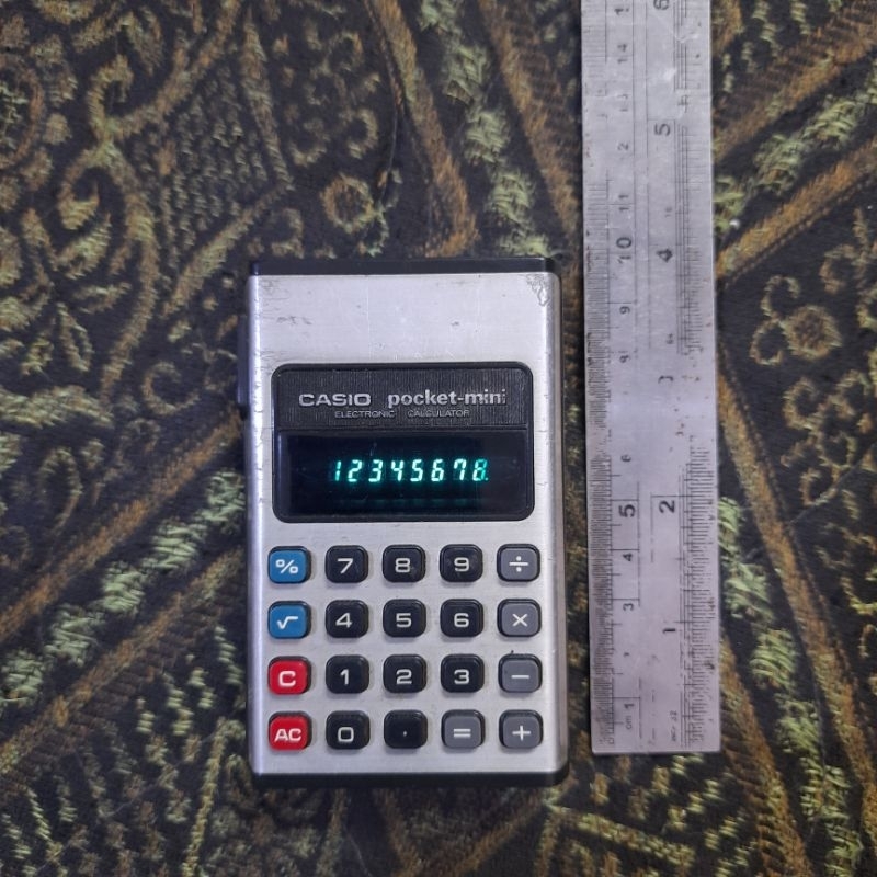

Casio pocket-mini CP801-B vintage Calculator 1975 bekas fungsi normal