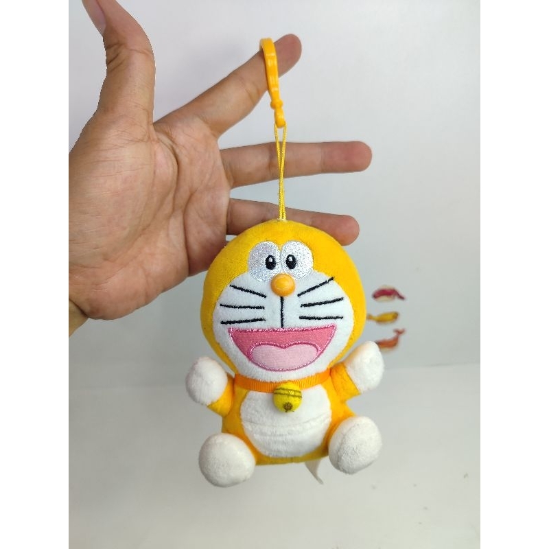 boneka doraemon kuning mini keychain brand pudar minus hidung