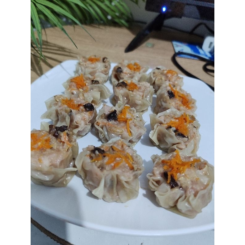 

Dimsum ayam jamur shitake isi 12 pcs (Frozen/Beku)