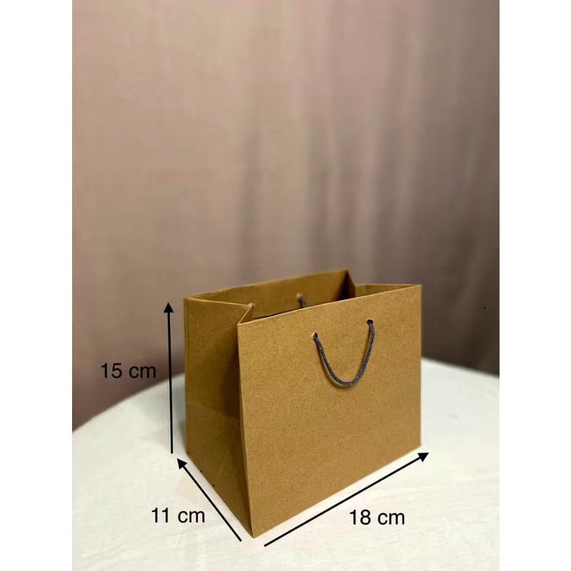 

PAPERBAG PIA COKLAT 18X11X15 CM TAS ACARA SOUVENIR HAJATAN OLSHOP MURAH KALSEL