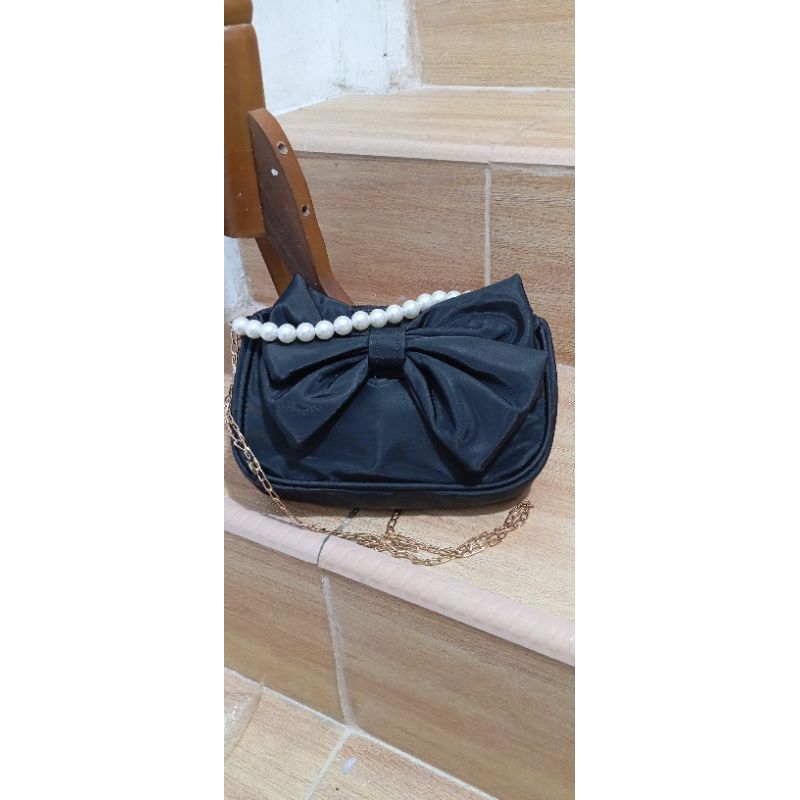 tas pesta wanita mutiara