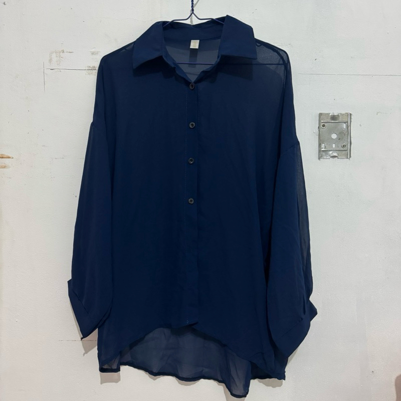 Kemeja pantai Sheer tembus pandang