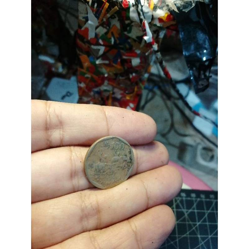 logam 100 rupiah tahun 1995