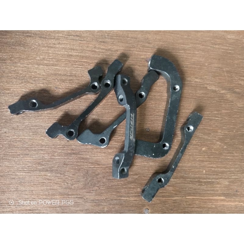 adaptor kaliver cakram sepeda