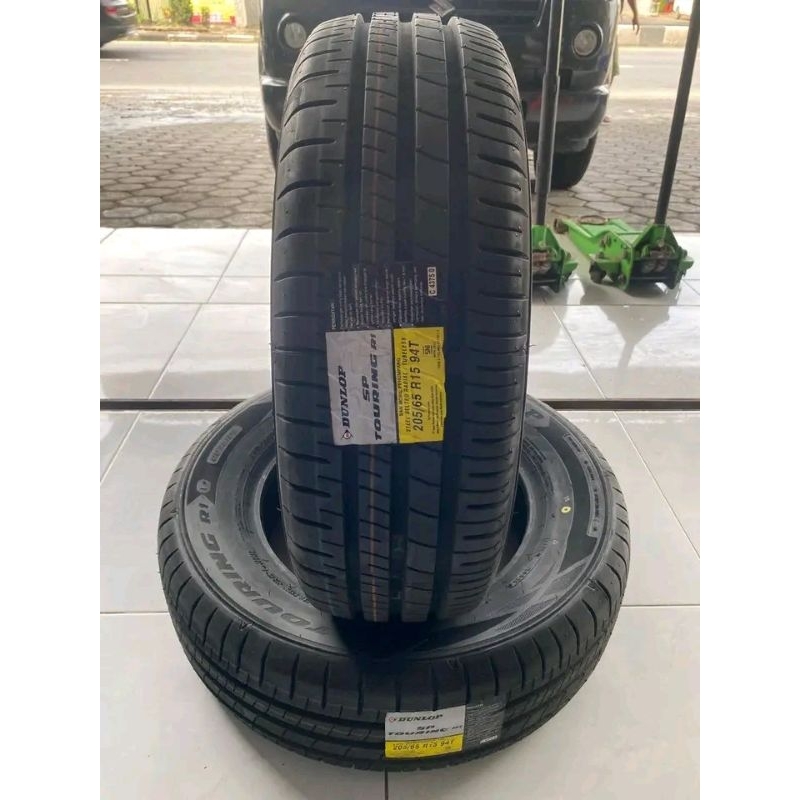 ban mobil dunlop 185/65 ring 15 tahun muda