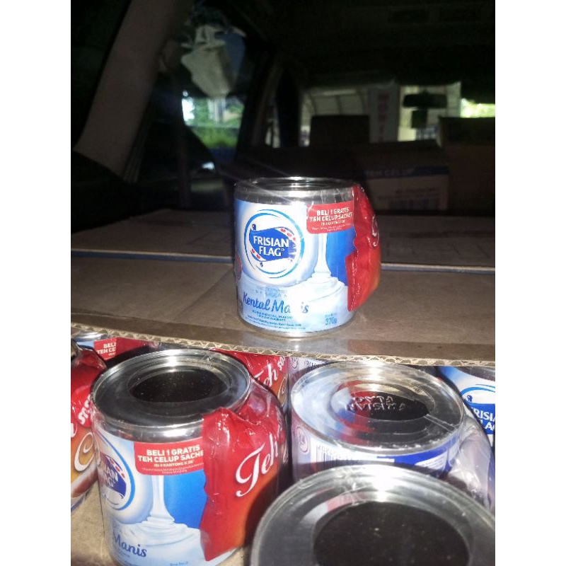 

Frisian Flag Kental Manis Kaleng 370g kemasan ECER Gratis Teh Sosro