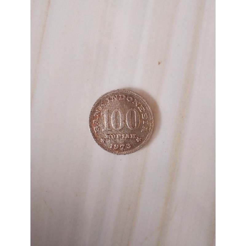 koin 100 Rupiah Indonesia tahun 1973