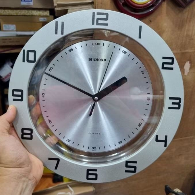 jam dinding sweep diamond transparan