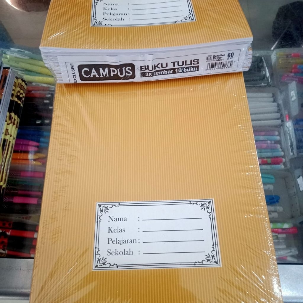 

buku tulis murah 38 lembar motif sampul coklat isi 10 pcs