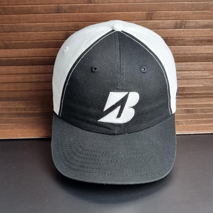 topi golf bridgestone dua warna