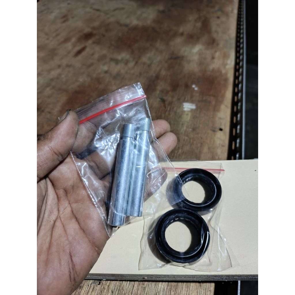 peninggi shock depan dan seal shock depan Suzuki A100